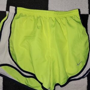 YELLOW NIKE RUNNING SHORS